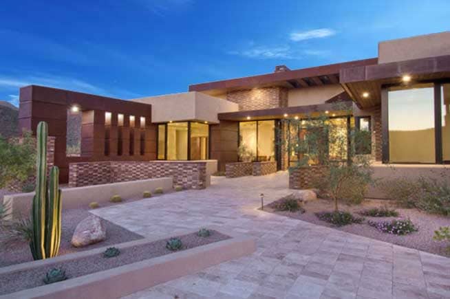 A stone driveway leading to a home in the luxury Seven Saguaros development in Marana, an area near Tucson, AZ