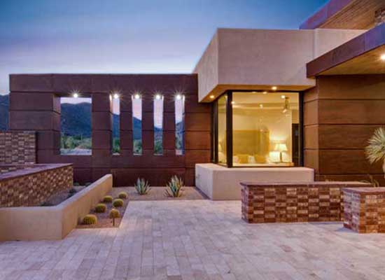 The contemporary entryway to a luxury custom home in the Seven Saguaros development