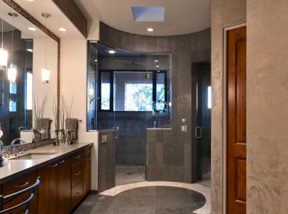 A beautiful, luxurious master bathroom with a large shower