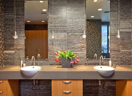 Two sinks side by side in a custom bathroom in a Stone Canyon luxury home